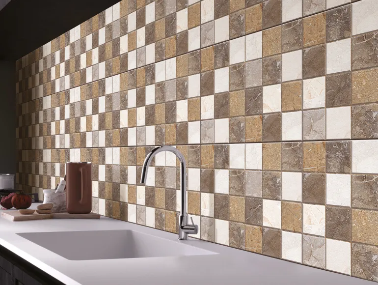 Beige Kitchen Design with white countertop and square design tiles.